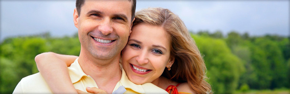 Couple smiling- Southbridge, MA- Central New England Oral and Maxillofacial Surgery